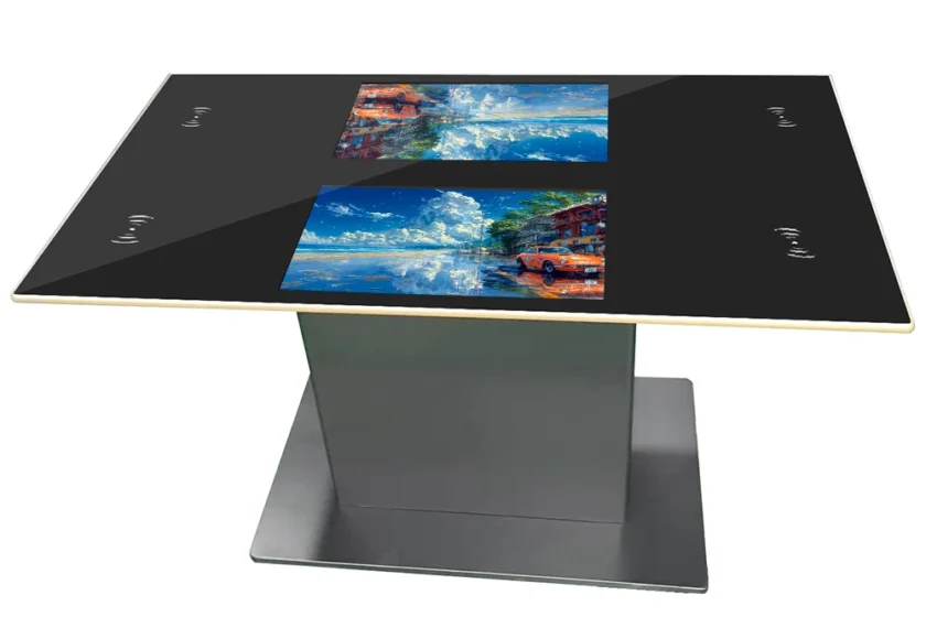 Students collaborating on touch table